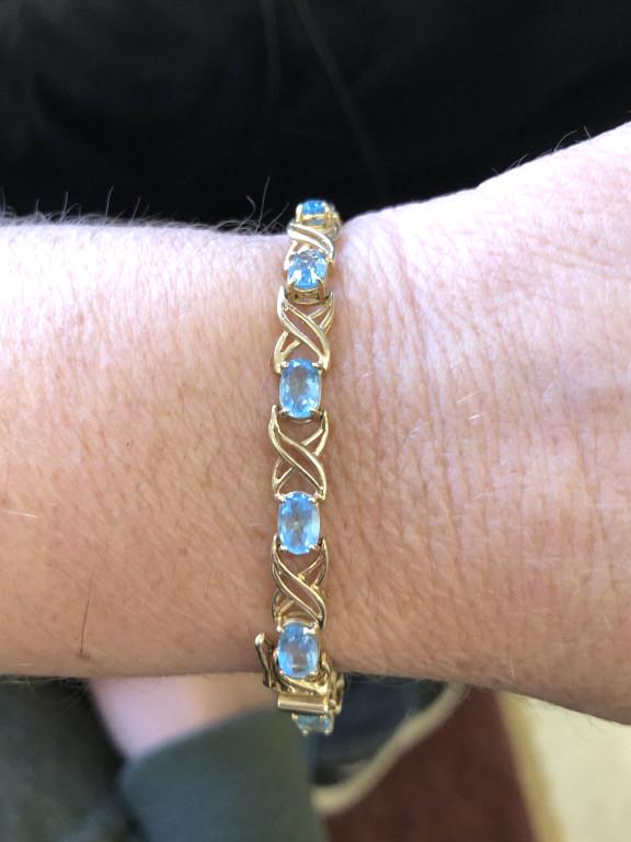 10K Gold and Topaz Bracelet: 10K Gold and Topaz Bracelet. Approx 5.5 pennyweights all in. 7" long. Condition, light wear.