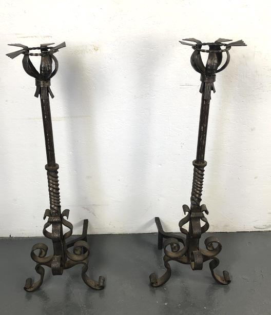 Pair of Wrought Iron Andirons: Pair of Wrought Iron Andirons. 39 1/2"h x 13"w x 18 1/2"d. Condition, some bent metal, scratches and scuffs