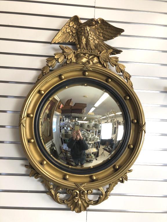 Federal Style Giltwood & Gesso Convex Mirror: Federal Style Giltwood & Gesso Convex Mirror with eagle crown. 38"h x 24"w. Condition, some missing pieces of composite, some loss of gilt, some cracks and scratches