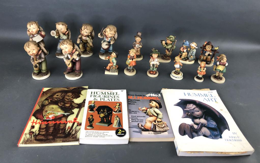 Group of Hummels, Goebel, and Wales Figurines: Tallest is 6 1/4" Condition, some chips to Wales figures, one broken piece on Wales figure, all need cleaning. Books have some creases , and stains and are in as is condition.