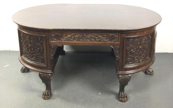 Horner Style Oval Mahogany Partner's Desk: Horner Style Oval Mahogany Partner's Desk .With 6 drawers.28 1/4"h x 60"w x 38"d.Condition, scratches, chips, scuffs, old repairs, some bubbling to veneer, loss of veneer, some cracks, some key escutc