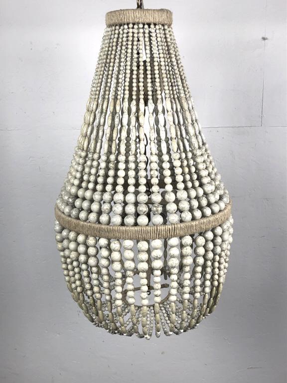 Beaded Rope Chandelier: Beaded Rope Chandelier. 35"h x 19 1/2" diam. Condition, some beads need tightening, one row missing
