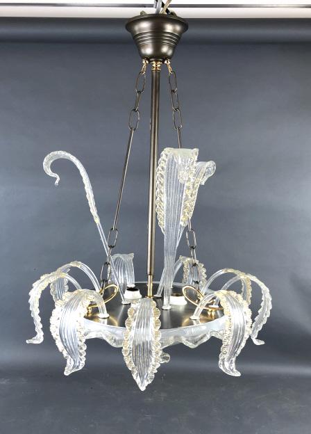 Murano Glass Chandelier: Murano Glass Chandelier, with up lighters and illuminated bowl. Manufactured by La Murrina. 27"h x 21"diam Condition - new old stock, like new
