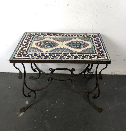 Turkish Tiletop Table: Turkish Tiletop Table . 20"h x 27 1/4"w x 18"d. Condition, tile has some cracks, chips and scratches. Base has surface rust
