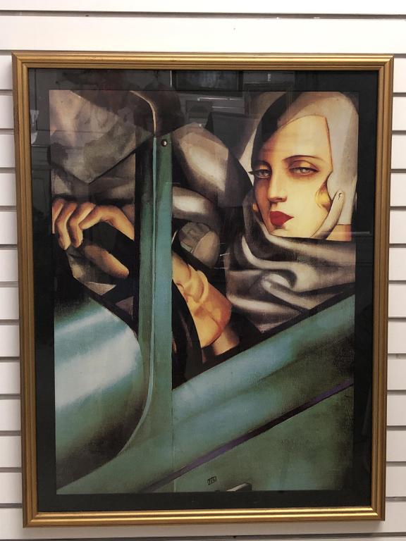 Tamara De Lempicka (Polish, 1898-1980) - Print: Tamara De Lempicka (Polish, 1898-1980) - Print. Self - Portrait in the Green Bugati. Sight is 31 1/2" x 23 1/4" Condition, needs cleaning, some scratches and scuffs to frame