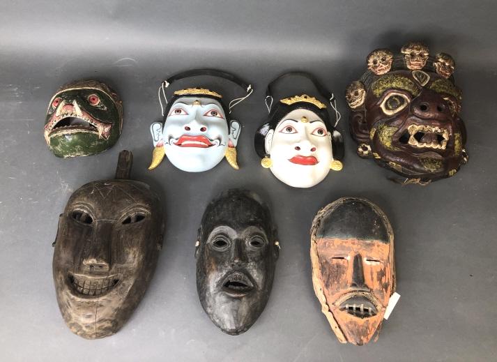 Group of Asian & Middle Eastern Masks: Group of Asian & Middle Eastern Masks. 7 pieces total. 11"h x 10"w x 4 1/2"d. Condition, scratches, scuffs, loss of paint, overall wear