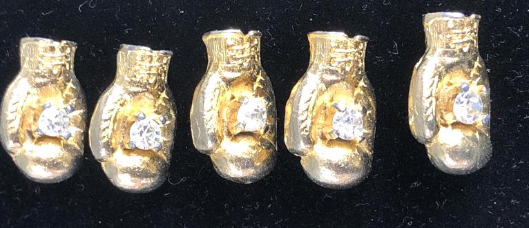 Group of 5 Boxing Glove Gold Plated Shirt Pins: Group of 5 Boxing Glove Gold Plated Shirt Pins. Provenance : Daniel Kapilow welterweight boxer. Active boxer 1941-1948 Condition, some wear to plate, needs cleaning
