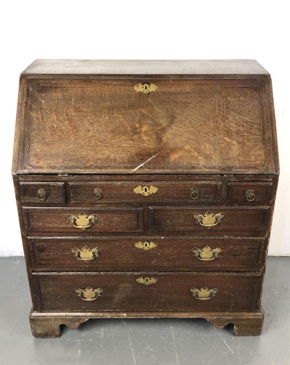 18th Century Oak Slant Front Desk: 18th Century Oak Slant Front Desk . 41"h x 36 1/4"w x 21"d. Condition, overall wear, old repairs, some cracks, some chipped wood, some residue house paint