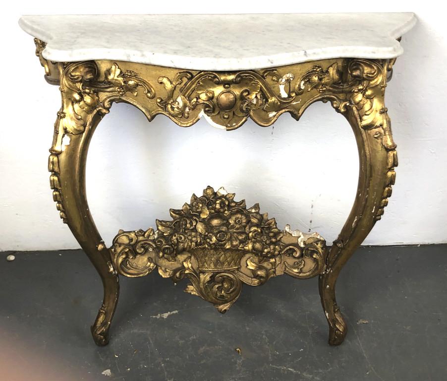Louis XV Style Giltwood and Gesso Console: Louis XV Style Giltwood and Gesso Console. With marble top. 34"h x 41"w x 17"d. Condition, some loss of gilt and gesso, loose stretcher