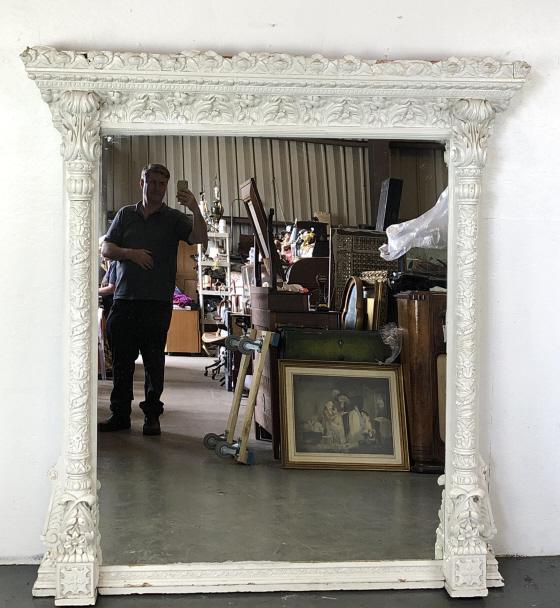 19th C. White Painted Wood & Gesso Mirror: 19th C. White Painted Wood & Gesso Mirror. Originally gilted. 69 1/2"h x 64"w. Condition, some old repairs, some loss of gesso , mirror replaced