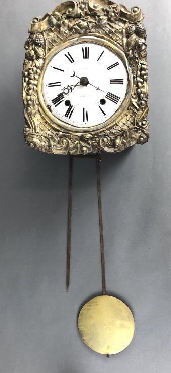 Carsac Talmont Wall Clock: Carsac Talmont Wall Clock. Clock without pendulum is 16" x 12 1/2" Condition, needs restoration, wear to metal , some bent metal, old repair to metal trim, untested, cracks in back, some holes in tin,