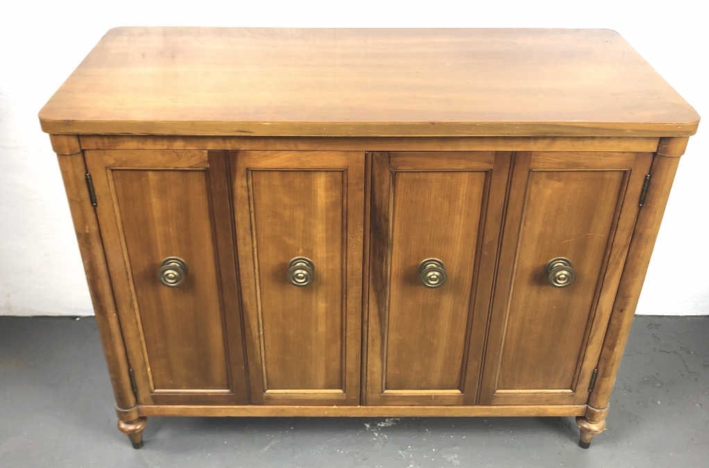 MCM Style Fruitwood Buffet: MCM Style Fruitwood Buffet . Manufactured by Brandt. 32"h x 42"w x 18"d. Condition, some scratches and scuffs, chipped and cracked veneer