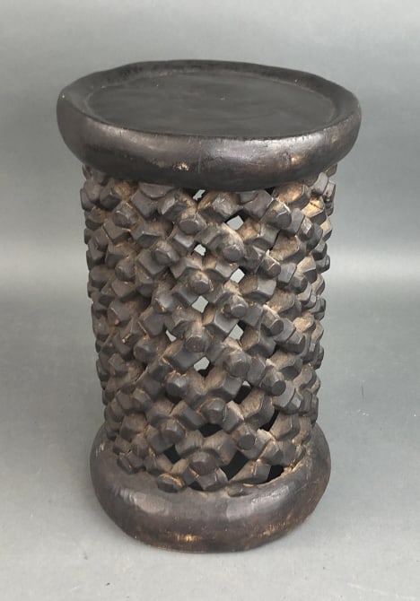 African Bamalike Carved Wood Stool: African Bamalike Carved Wood Stool. 13 1/2"h x 8 1/2"dia Condition, some scratches and scuffs