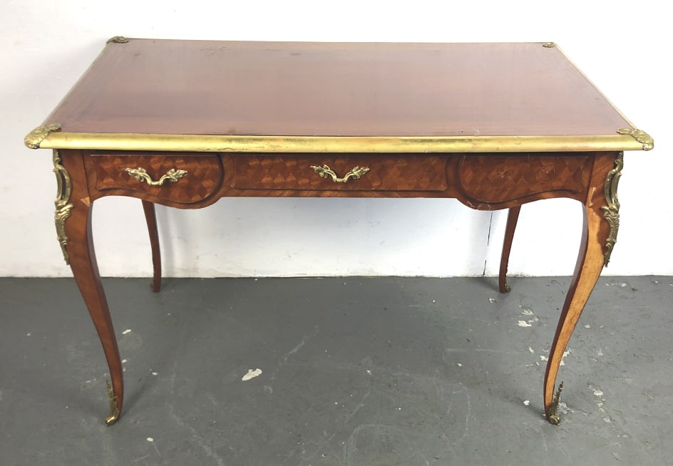 Louis XV Style Bureau Plat: Louis XV Style Bureau Plat. 30"h x 45 1/2"w x 25 1/2"d. Condition, loss of veneer, loss of brass molding, loss of handle