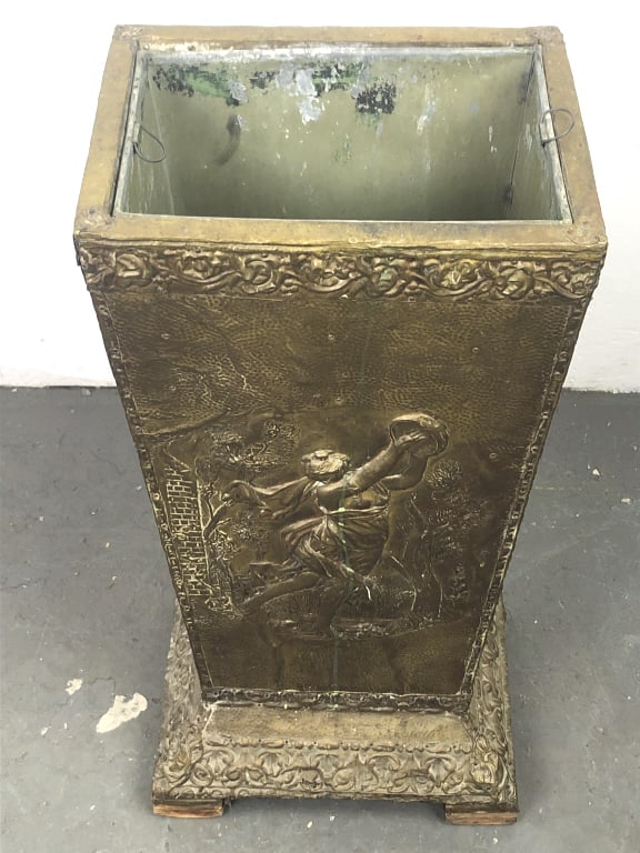 Brass Clad Umbrella Stand: Brass Clad Umbrella Stand. 23 1/2"h x 14"w x 9 1/2"d Condition, missing some batting on feet, needs cleaning