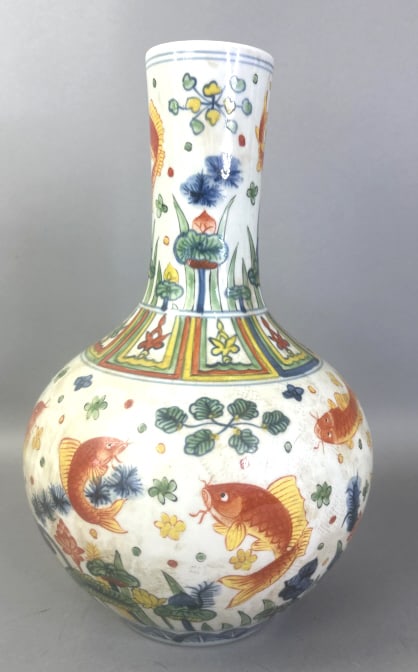 Chinese Porcelain Vase with 6 Character Mark: Chinese Porcelain Vase with 6 Character Mark. With Koi fish design. 15 1/2" h x 10" diam. Condition, some staining, some tape residue, some marks