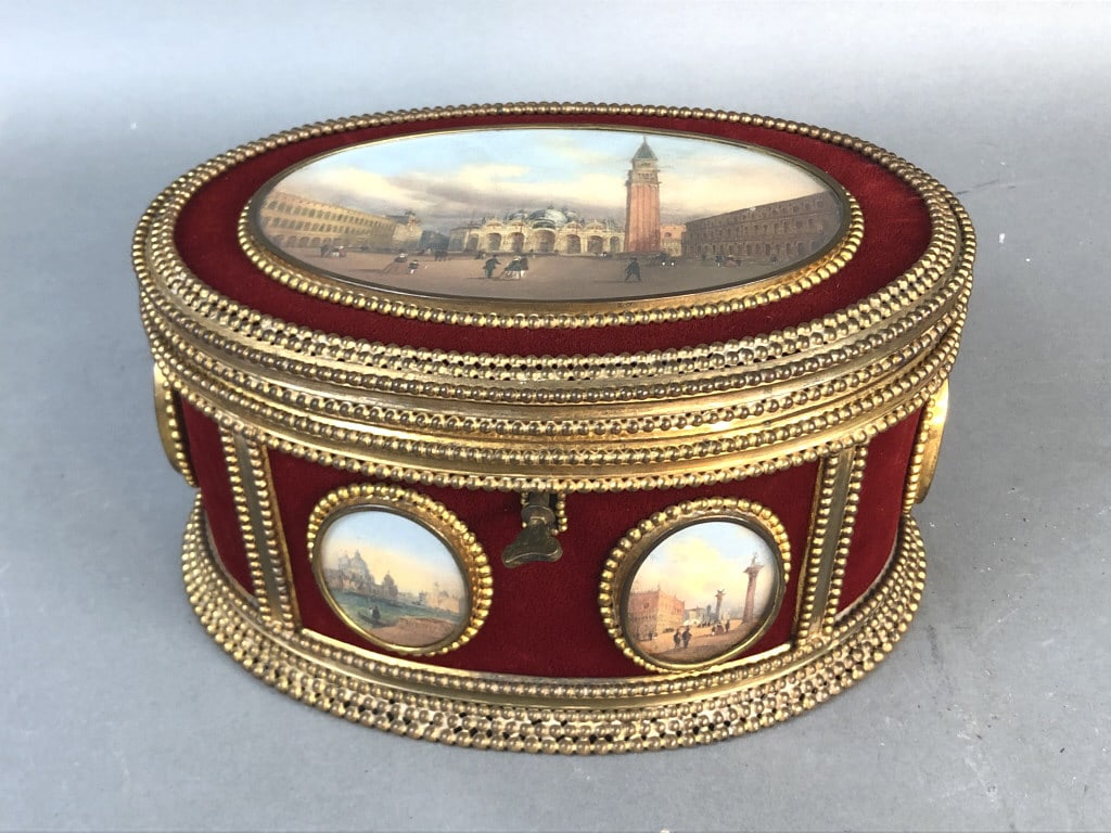 Gilt Bronze & Velvet Jewelry Box: Gilt Bronze & Velvet Jewelry Box. With 7 hand painted Venetian plaques. 5"h x 9 1/2" w x 7"d. Condition, needs cleaning, light wear
