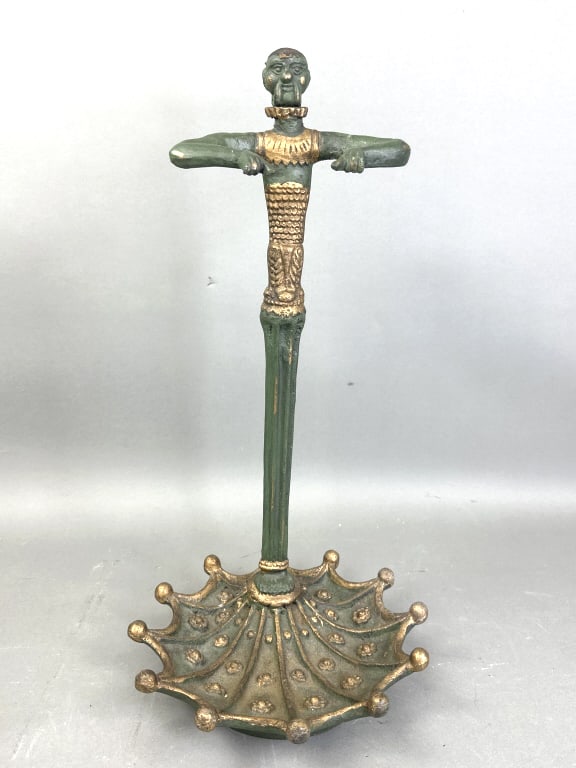 Cast Iron Figural Umbrella Stand: Cast Iron Figural Umbrella Stand. 21 1/4"h x 11" diam. Condition, scratches and scuffs, wear to paint