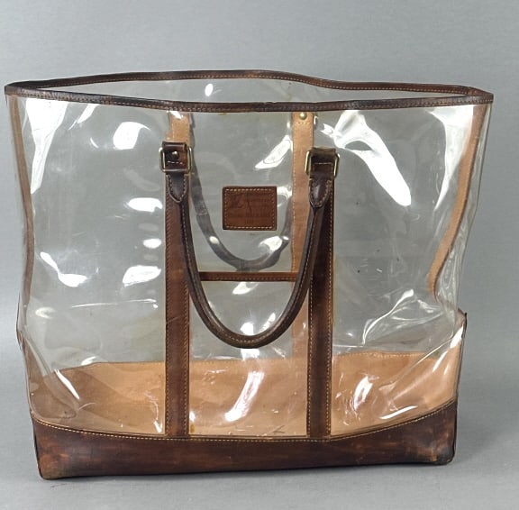 Isaac Mizrahi Louis Vuitton Clear Vinyl Weekender: Isaac Mizrahi Louis Vuitton Clear Vinyl Weekender. Serial number TH094B. 15 3/4"h x 18"w x 11"d. Condition, scratches and scuffs