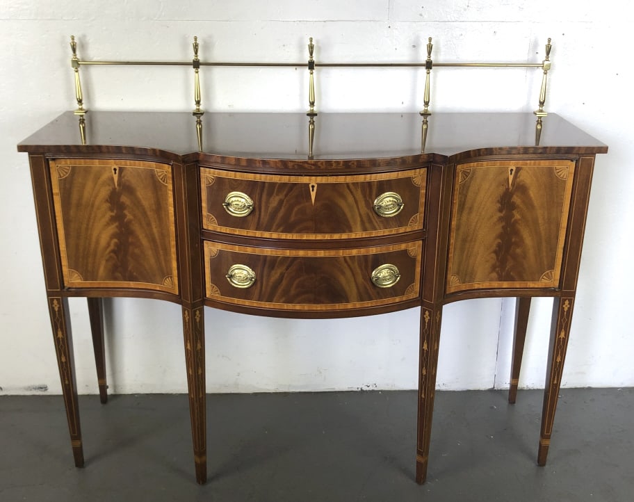 Councill Mahogany Inlaid Sideboard: Councilll Mahogany Inlaid Sideboard with brass gallery 46 1/2"h x 56 "w x 21"d Condition: Some minor scratches and scuffs