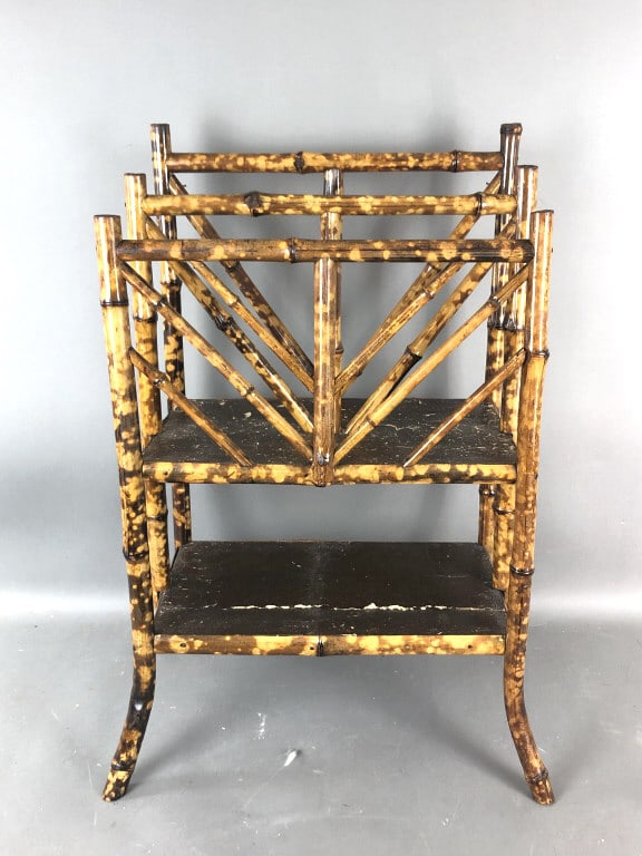 Bamboo Magazine Rack: Bamboo Magazine Rack 30"h x 21"w x 13 1/2"d Condition: Some wear to finish, needs tightening.