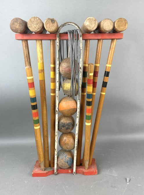 Croquet Set: Croquet Set. 24"h x 16" w x 6" d (as shown). Condition: overall wear, well played, scratches, scuffs, chips, loss of paint, some rust