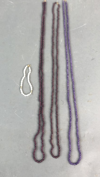 14K Clasps Garnet Amethyst and Pearl Jewelry: 14K Clasps Garnet Amethyst and Pearl 36" Long Necklaces 7 1/2 " Bracelet Condition, good
