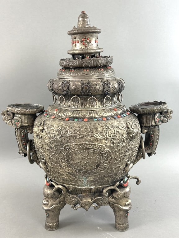 Ornate Asian Incense Burner: Ornate Asian Incense Burner. Likely Sino-Tibetan with turquoise and coral color stones, repousse design 23 1/4" h x 19"w x 12"d. Condition: Scratches and scuffs, missingstones, bent metal, lid does no