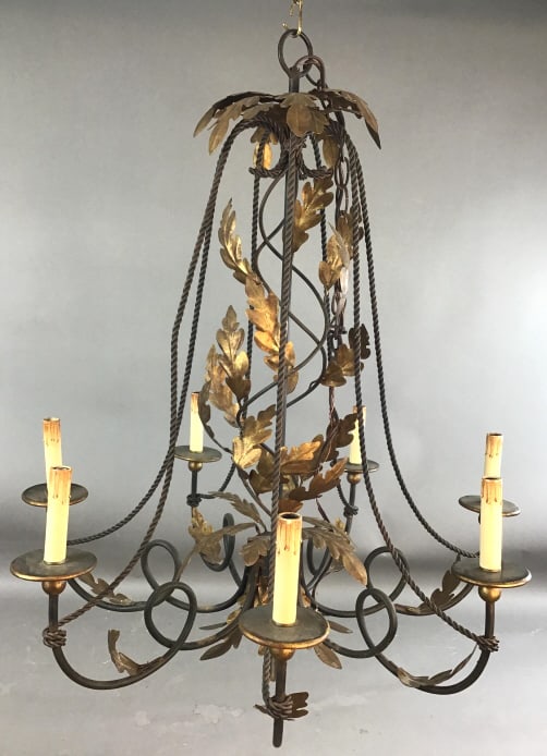 Wrought Iron Seven Arm Chandelier: Wrought Iron Seven Arm Chandelier Gilded oak leaf design. 32"h x 28"d Condition: Untested, needs cleaning.