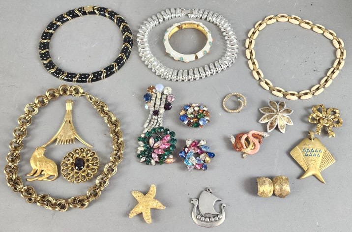 Group of Signed Costume Jewelry: Group of Signed Costume Jewelry. Weiss, Swarovski, Erwin Pearl, MMA, Pauline Rader, St John, HCF, DG, Les Benard, and others. Condition: See pictures, some loss of enamelon Rader bracelet.