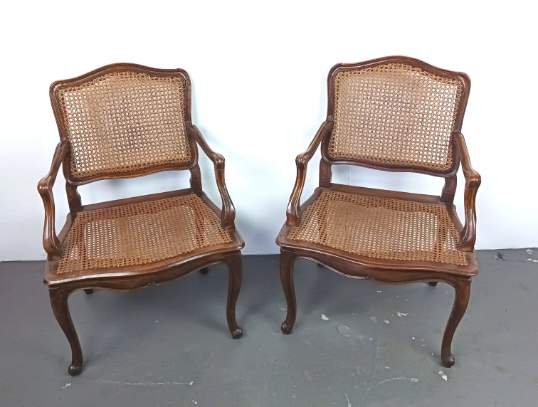 Pr of Louis VX Fruitwood Fauteuil Arm Chairs: Pr of Louis VX Fruitwood Fauteuil Arm Chairs. With caned back and seat, upholstered cushions with tassels. 35"h x 25"w x 22"dCondition: Old repairs, some scratches and scuffs.