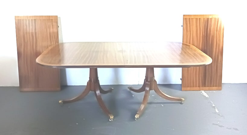 Mahogany Double Pedestal Dining Table: Mahogany Double Pedestal Dining Table, with two 24" leaves. 30"h x 78"w x 45"d Condition: Some sun bleaching, wear to finish, scratches and scuffs.