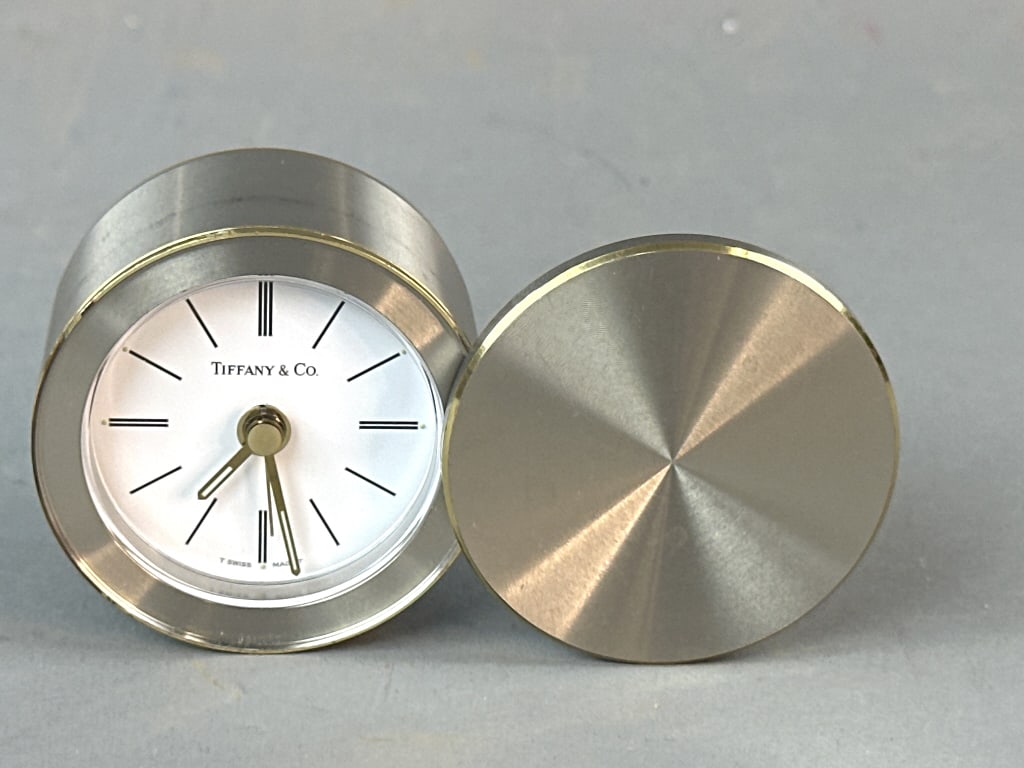 Tiffany & Co. Travel Alarm Clock: Tiffany & Co. Travel Alarm Clock. 2 3/8"h x 1 1/2"d. Condition: Untested and some scuffs.