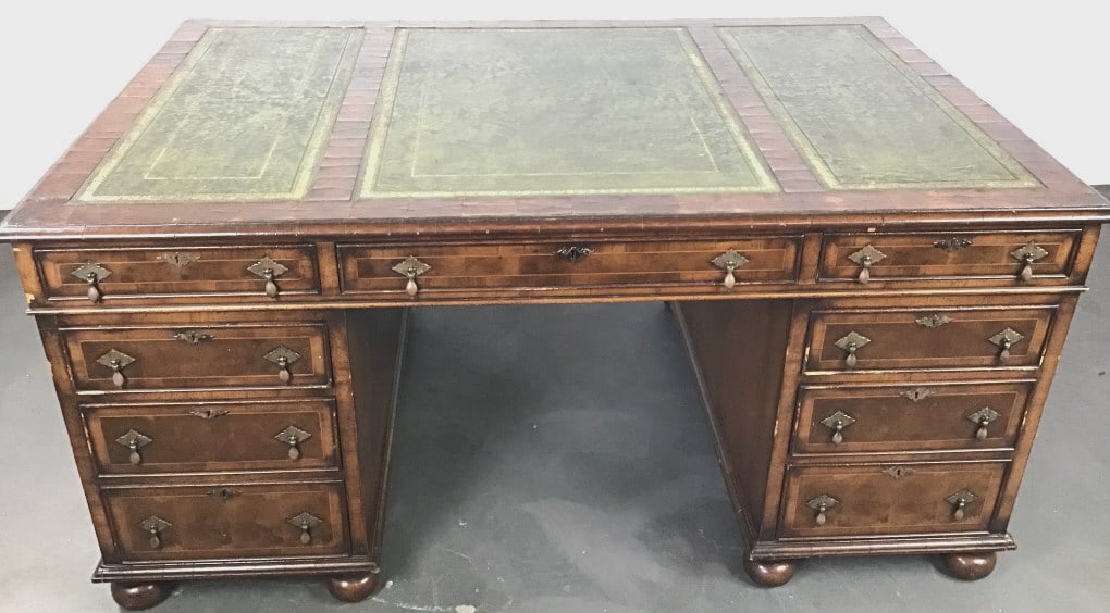 Queen Anne Style Oyster Veneer & Leather Top Desk: Queen Anne Style Oyster Veneer & Leather top Desk. 31 1/2"h x 65 1/2"w x 42"d. Condition: Overall wear, scratches, chipped veneer, scuffs to wood, leather and chipped veneer.