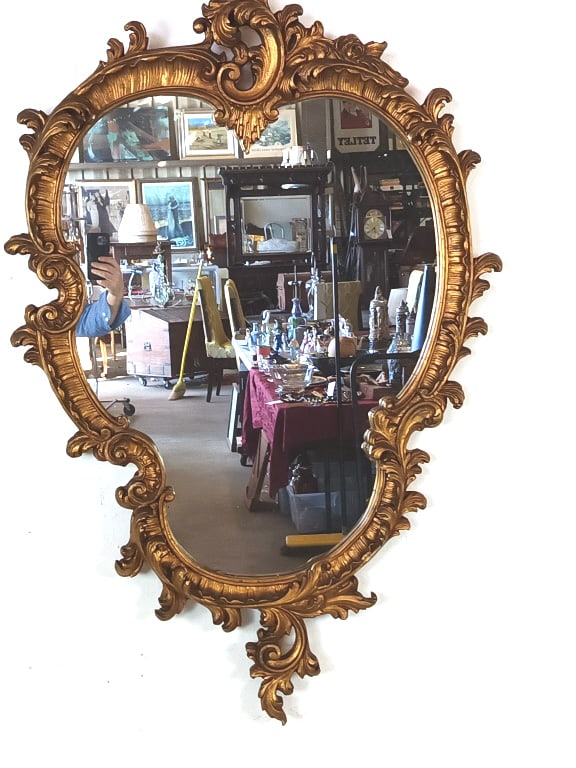 Rococo Style Giltwood Mirror: Rococo Style Giltwood Mirror. 57"h x 35"w Condition: Some loss of gilt, some scratches and scuffs.