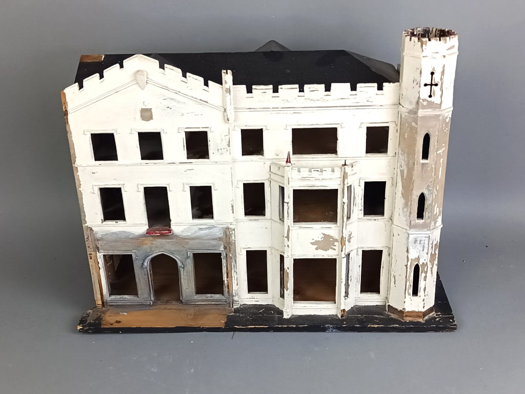Castle Form Doll House: Castle Form Doll House. 15 1/2"h x 20 1/2"w x 8"d Condition: Overall wear and some wood loss.
