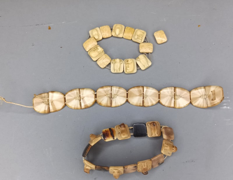 Group of Inuit Bone Bracelets: Group of Inuit Bone Bracelets. Condition: Some broke stringing and one loose piece.