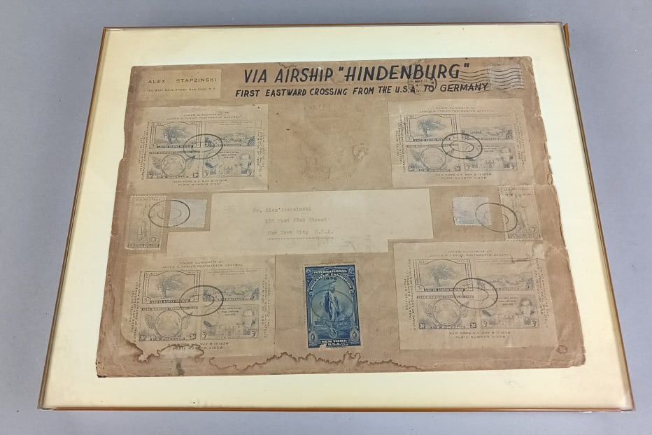 Hindenburg Air Ship Framed Piece of Mail.: Hindenburg Air Ship Framed Piece of Mail. Overall: 14"h x 11"w Condition: Overall wear, stains and fading.