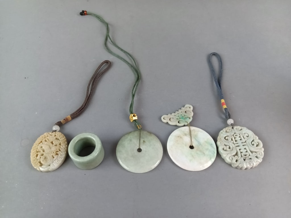 Group of Carved Jade Pendants: Group of Carved Jade Pendants. Largest: 2 1/4" diam. Condition: Good.