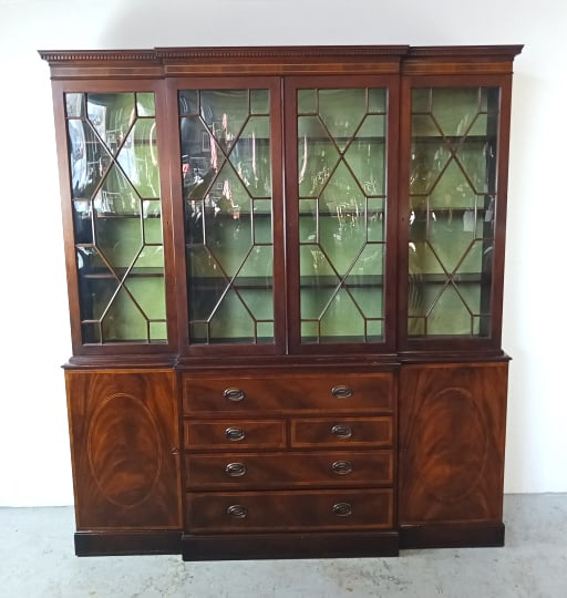 Georgian Style Mahogany Secretary Breakfront: Georgian Style Mahogany Secretary Breakfront. Individual glass panes. 85"h x 75 1/2"w x 12 1/2"d Condition: Some scratches, scuffs and chipped veneer.