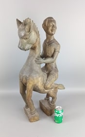 Carved Figure of Man on Horse Signed