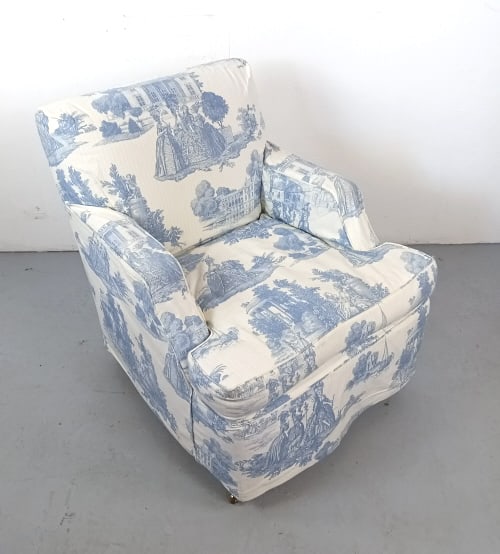 Upholstered Easy Chair with Toile Slipcover: Upholstered Easy Chair with Toile Slipcover. Cushion is 50% down and 50% goose feathers. 34"h x 30"w x 35"d. Condition: Some minor stains.
