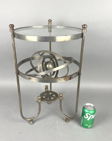Armillary Metal Side Table: Armillary Metal Side Table. 20 1/2"h x 12 1/2"diam. Condition: Some oxidation to patina.