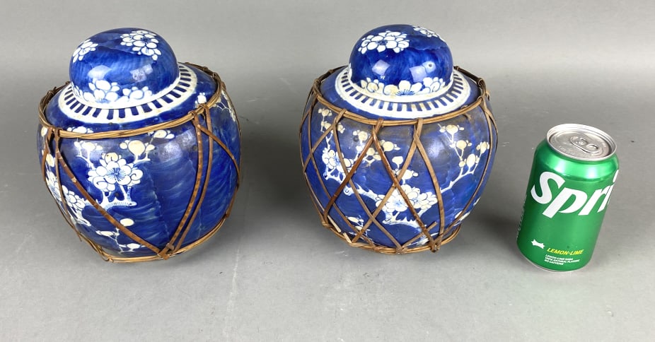 Pair of Chinese Blue & White Ginger Jars: Pair of Chinese Blue & White Ginger Jars. 8 1/4"h x 7"diam. Condition: Needs cleaning.