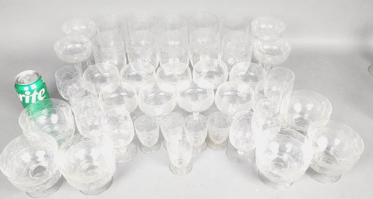 Etched Glass Set Drinking, Bowls & Plates: Etched Glass Set Drinking Glasses & Bowls all the same pattern. Approx. 43 pieces. Comprising of: 10 water glasses, 5 1/2"h. 4 fluted champagnes, 5 1/2"h.9 champagnes, 4"h. 8 wine glasses, 4 1/4"h. 5 