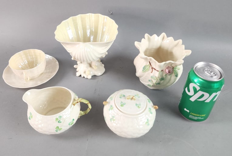 Grouping of Belleek Brown and Green Marks: Grouping of Belleek Brown and Green Marks 6 pieces. Creamer and Sugar are brown marks and the rest green. Tallest: 5"hCondition: Overall good.