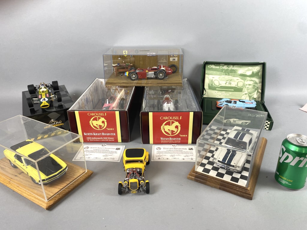 8 Racing Cars w/ Steve McQueen "Le Mans": 8 Racing Cars w/ Steve McQueen "Le Mans". Comprising of: Steve McQueen "Le Mans", Watson Roadster, Kurtis Kraft Roadster, Lotus Ford Type 49B, Ford Mustang GT350 (tire off), Boss 302Mustang, and Ferra