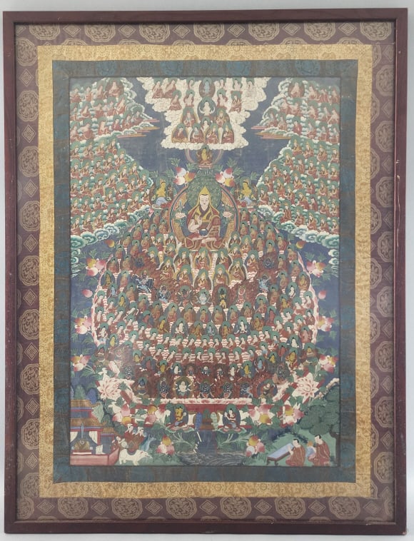 Tibetan Buddhist Thangka Refuge Field: Tibetan Buddhist Thangka Refuge Field. Triple silk border. Overall: 40 1/2"h x 31"w Condition: Some scratches and scuffs to frame.
