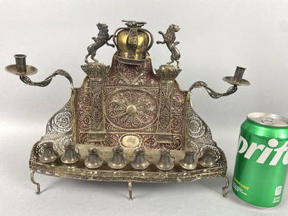 Russian Silver Hanukkah Menorah Marked B.M: Russian Silver Filigree Hanukkah Menorah Marked B.M. 29.5 OZ marked 84. 10"h x 11 1/2"w x 3 3/4"d Condition: Needs cleaning.