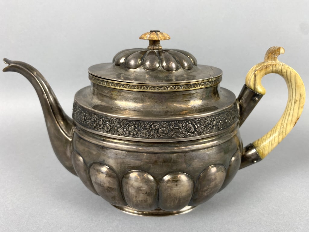 Mikhail Karpinsky Russian Silver & Bone Teapot: Master Mikhail Karpinsky Russian Silver & Bone Teapot 1827. Gilt inside, All in:19.7 oz. marked 84. Approx. 6 1/2"hCondition: A chip and cracking to bone, needs cleaning.